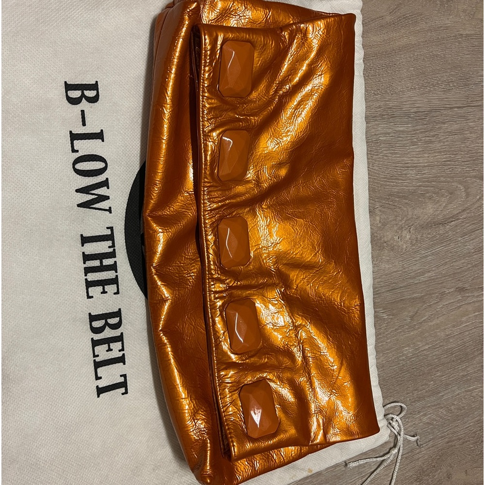 B-low the belt leather clutch